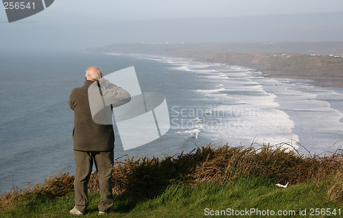 Image of man on cliff-top