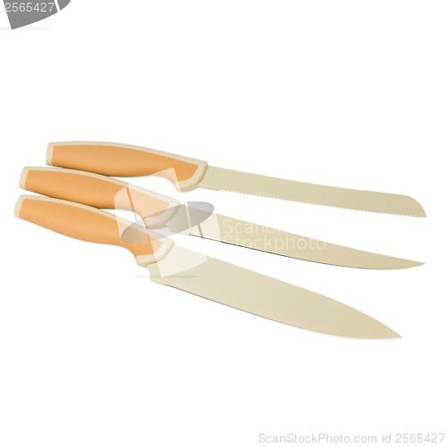 Image of set beige of knives for kitchen isolated (clipping path)