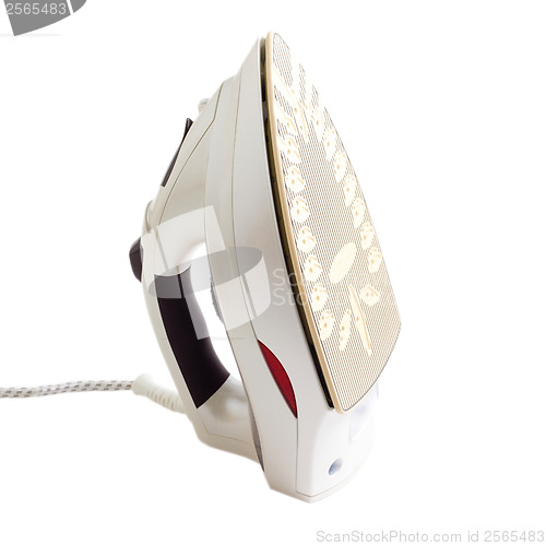 Image of white flatiron electric iron Modern clothes isolated on white ba