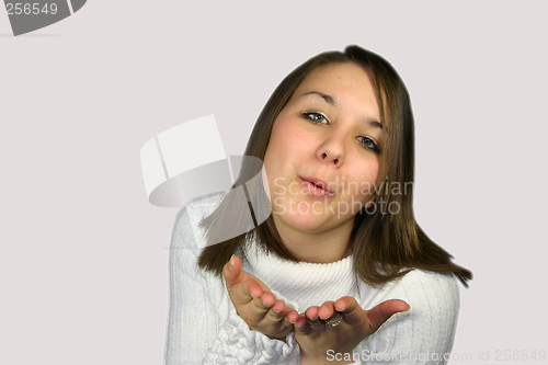 Image of young female in a white jumper