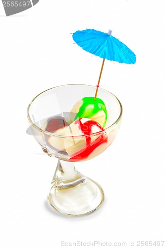 Image of ice cream balls in a glass beaker isolated on white background