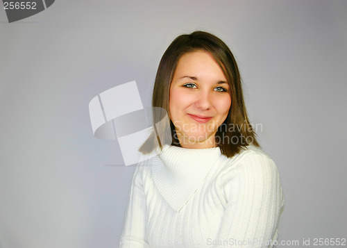 Image of young female in a white jumper