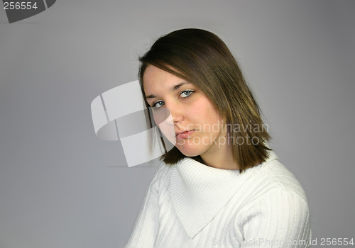 Image of young female in a white jumper