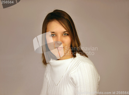 Image of young female in a white jumper