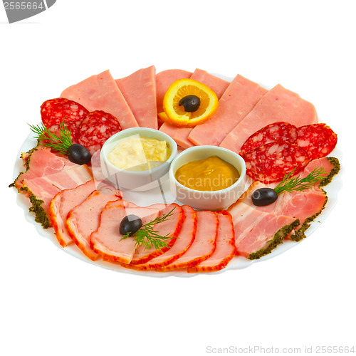 Image of sliced smoked ham sausage appetizer with mustard, horseradish an