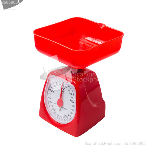 Image of red kitchen scales  on white background