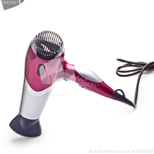 Image of purple hair dryer is isolated on a white background