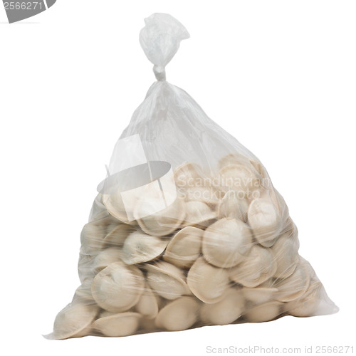 Image of raw dumplings in a plastic cellophane bag isolated on white back