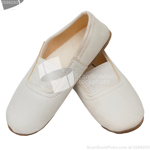 Image of old children's white  pink pointe shoes ballet slippers isolated