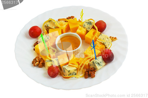 Image of cheese food grapes nuts salad isolated on white background clipp