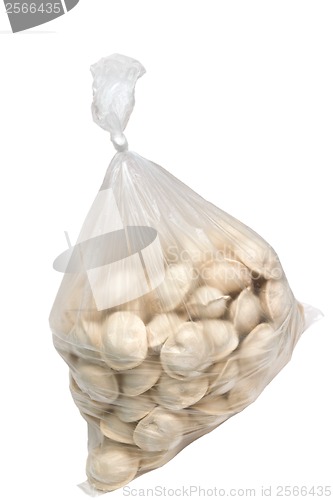 Image of raw dumplings in a plastic cellophane bag