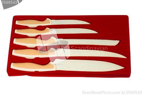 Image of set red of knives for kitchen isolated (clipping path)