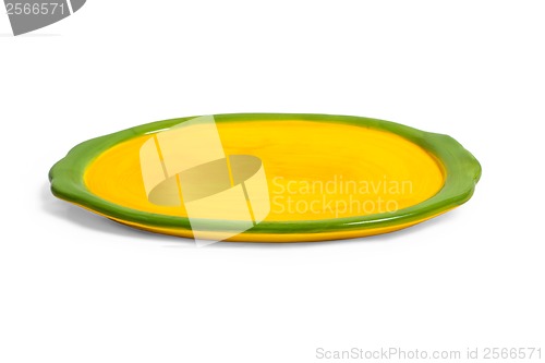 Image of Yellow plate for food isolated on white background