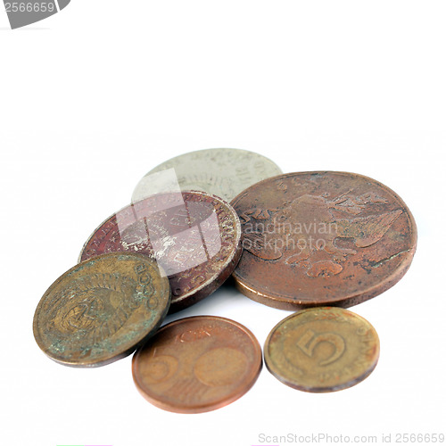 Image of old coins on a white background
