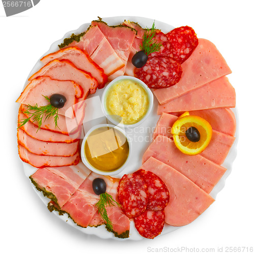 Image of sliced smoked ham sausage appetizer mustard, horseradish and dil
