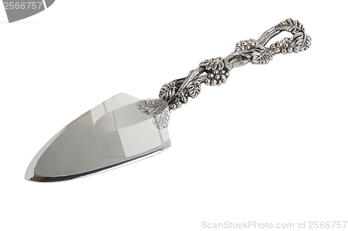 Image of antique silver knife blade for cake isolated on white background