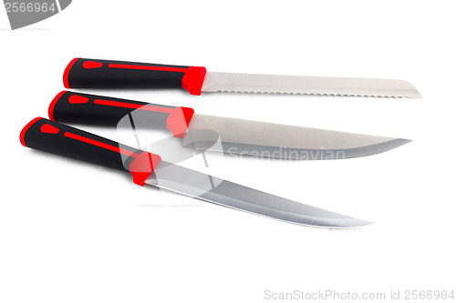 Image of three red kitchen knife on white (clipping path)