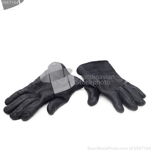 Image of pair black of leather gloves isolated on white background