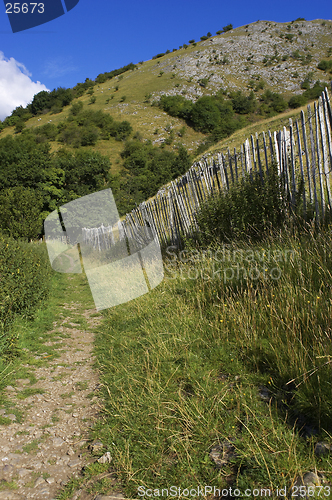 Image of Walking path lined by picket fence in the English peak district