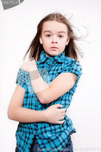 Image of Disheveled crying young girl