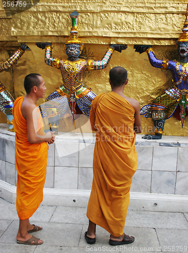 Image of Monks inspect statues at the Grand Palace, Bangkok, Thailand - E