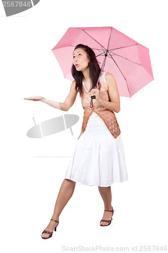 Image of Woman with pink umbrella