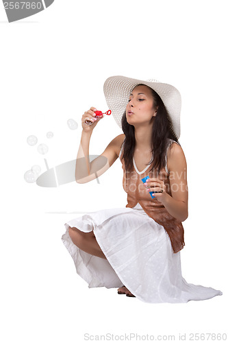 Image of Woman in white sun hat