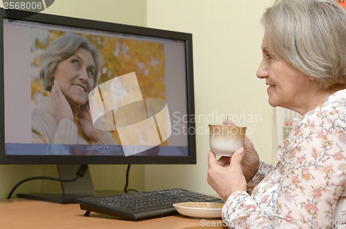 Image of Mature woman relaxing