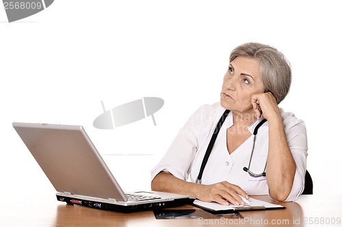 Image of Positive elderly doctor