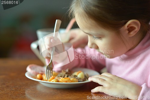 Image of Little baby eats
