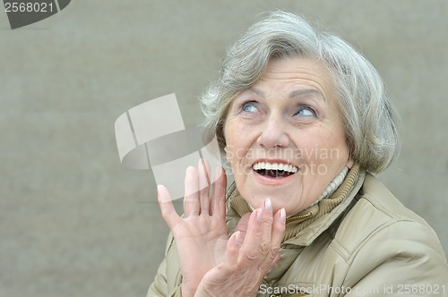 Image of Happy woman posing in autumn