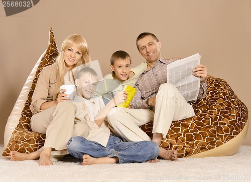 Image of Family of four having fun
