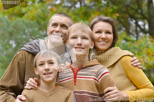 Image of Family of four in park