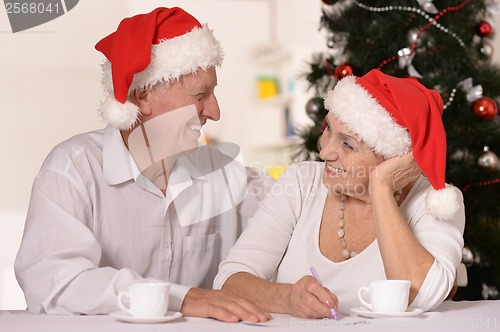 Image of Mature couple celebrating new year