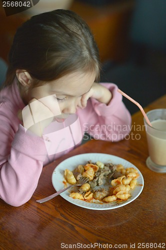 Image of Little baby eats