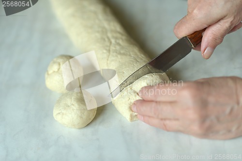 Image of Woman making dough