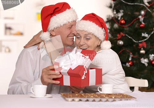 Image of Mature couple celebrating new year