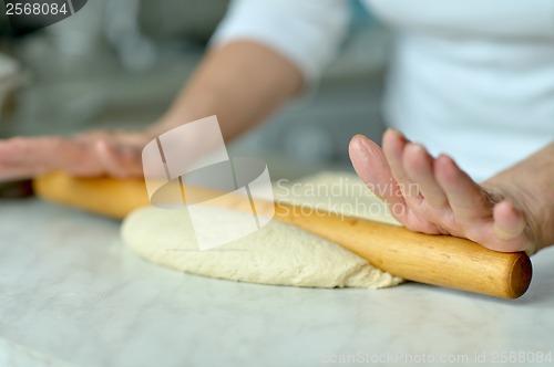 Image of Woman making dough