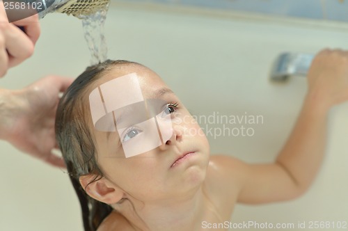 Image of Little girl in bath