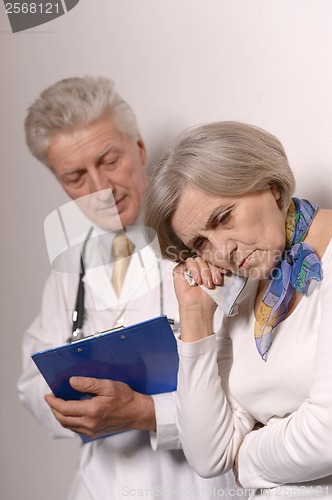 Image of Senior woman visiting doctor