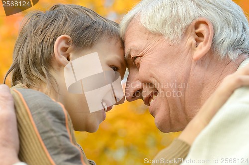 Image of Old man with grandson.