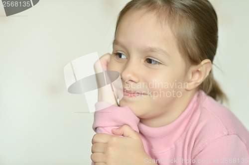 Image of Portrait of emotional girl at home