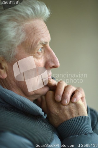 Image of Thinking elderly man