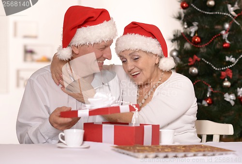 Image of Mature couple celebrating new year