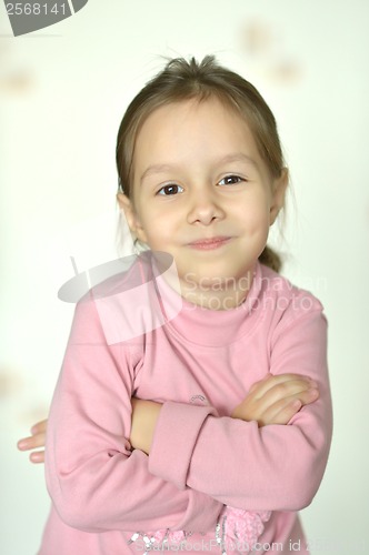 Image of emotional little girl at home