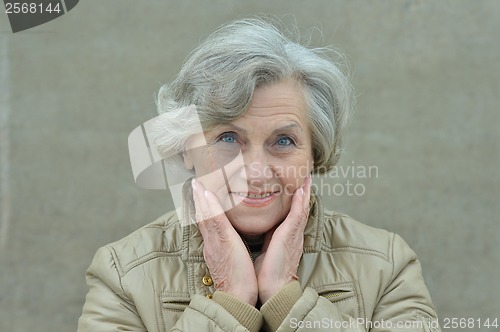 Image of Happy woman posing in autumn