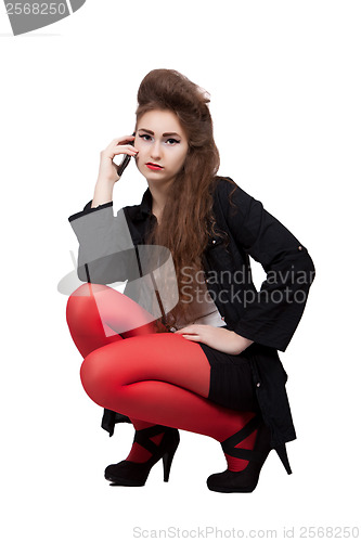 Image of Teenage girl in black and red clothes