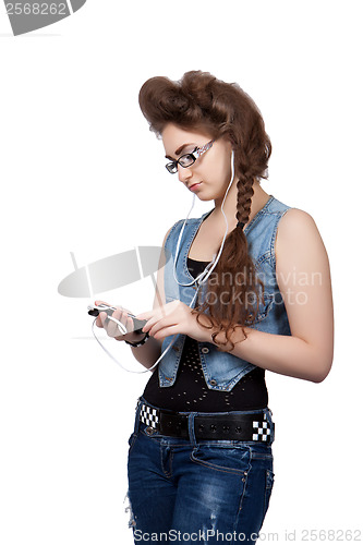 Image of Teenage girl in a blue denim dress