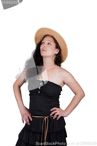 Image of Long-haired brunette in a straw hat