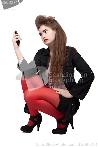 Image of Teenage girl in black and red clothes